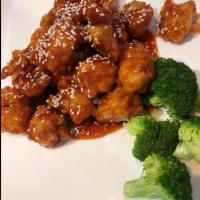 Sesame Chicken  · Fried and cooked in a tangy sweet sauce with a side of steamed broccoli.