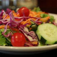 House Salad · Mixed lettuce, grape tomatoes, carrots, cucumbers and red cabbage. 