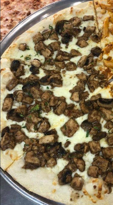Chicken Marsala Pizza · Chunks of chicken, mushrooms and mozzarella.