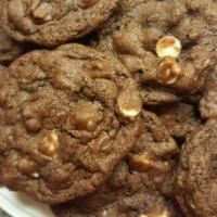 Triple Chocolate Chip Cookies · Delicious triple chocolate cookies featuring a cocoa cookie loaded with milk and white choco...
