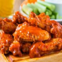 6 Classic Chicken Wings · Choice of 8 wing flavors. Choice of 1 dipping sauce.