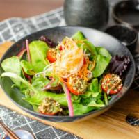 312 Salad · Mixed greens, konbujime tomatoes, shallots, carrots, and jujube vinaigrette.