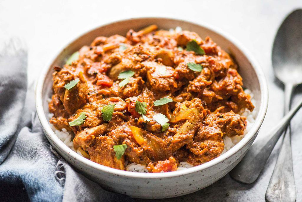 Chicken Tikka Masala · Succulent pieces of boneless chicken marinated in Tandoori sauce. Cooked with special flavorful cream sauce with peeled tomatoes and different herbs.
