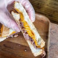 Chipotle Roast Beef Panini · Rustic Italian or gluten-free bread with roast beef, chipotle aioli, and cheddar cheese