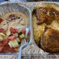 Roasted Chicken Plate Lunch · Rice, salad, hummus, beta bread and red sea sauces.