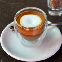 Macchiato · 2 shots of espresso, with a dash of steamed milk.
