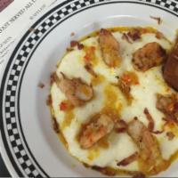 Shrimp and Grits Dinner · Savory grits topped with grilled shrimp, Cajun gravy, and crumbled bacon. Little waffle and ...