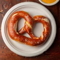 Giant Jalapeno German Pretzel · Larger authentic jalapeno Bavarian pretzel with a side of craft beer cheese dip.