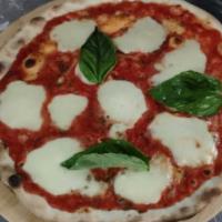 Napoletana Pizza · Parmesan, fresh mozzarella, tomato sauce, and basil.
