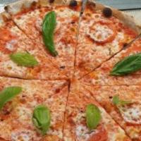Margherita Pizza · Cheese, tomato sauce, basil and tomato.
