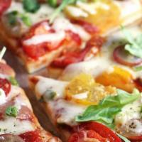 Caprese Pizza · Fresh mozzarella cheese, cheese, tomato sauce, tomato, basil and olives.