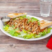 Grilled Chicken Caesar Salad · Romaine lettuce, croutons, Parmesan cheese, and with Caesar dressing. Served with French or ...