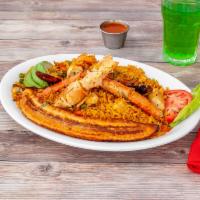 Arroz Marinero · Fried yellow rice mixed with shrimp, mussels, clams, tilapia fish, crab legs, crab meat, and...