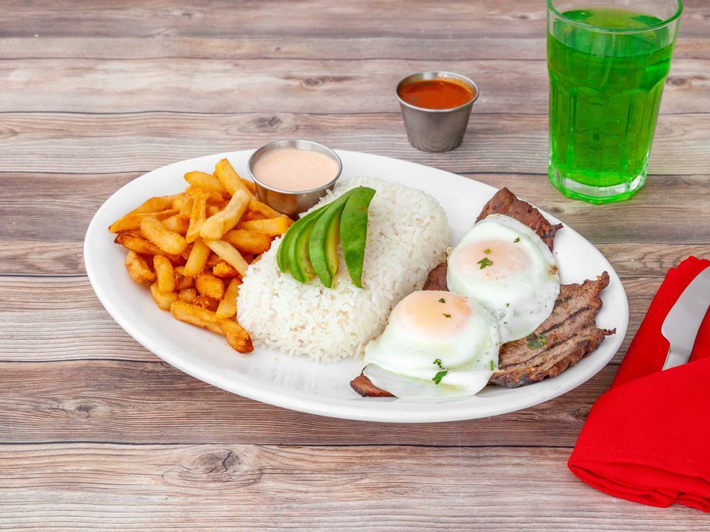 Carne Asada Chuasco · Top round steak saute onions, greens, red peppers, and tomato. Served with rice, 2 fried eggs, avocado, and french fries.