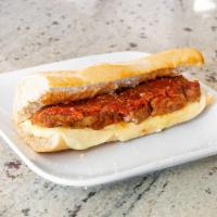 Sausage Grinder  · Sweet Italian sausages paired with slow cooked red sauce generously laid on a fresh grinder ...