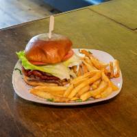 Picanha Burger · 8 oz. of picanha burger, american cheese, lettuce, tomatoes, onions, pickles and mayo. Serve...