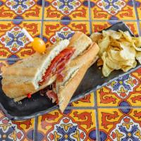 Bocata el Cubata Especial Sandwich · Cured Iberian pork shoulder, cured Iberian pork loin, chorizo, manchego and piqquillo pepper. 