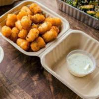 Tatertots with Miso Ranch · tossed in furikake, served with miso ranch