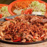 Parrillada for 2 · Carnitas, shrimp, Mexican sausage, chicken and beef, all deliciously sauteed with onions, be...