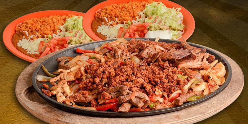 Parrillada for 2 · Carnitas, shrimp, Mexican sausage, chicken and beef, all deliciously sauteed with onions, bell peppers and tomatoes. Served with guacamole salad, sour cream, rice, beans and tortillas.