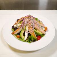 Grilled Chicken Salad · Grilled and sliced chicken breast, served atop fresh assorted greens with sliced fresh avoca...