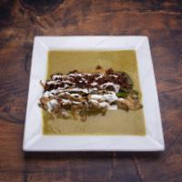 Queso Azteca · Grilled panela cheese, served on a bed of tomatillo sauce, topped with poblano strips, mushr...