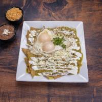 Chilaquiles · Fried triangle of corn tortilla, covered with homemade green or red sauce, topping with fres...
