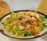 Grilled Chicken Caesar Salad · Grilled Italian chicken, croutons and Caesar dressing over romaine lettuce.