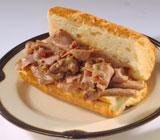 Classic Beef Sandwich · Italian beef, marinara, sauteed onions, green peppers and melted mozzarella cheese.