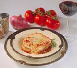 Baked Lasagna · Homemade from the family recipe. Layers of noodles and cheese smothered in marinara sauce an...