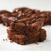 Double Chocolate Brownie · Made with Ghirardelli chocolate and topped with a drizzle of Ghirardelli chocolate sauce.