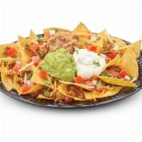Nachos · Corn tortilla chips topped with cheddar and pepper jack cheese, homemade salsa fresca, refri...