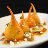 Baby Beets · Baby golden beets roasted and served with  goat cheese, toasted sunflower seeds, honey, fres...