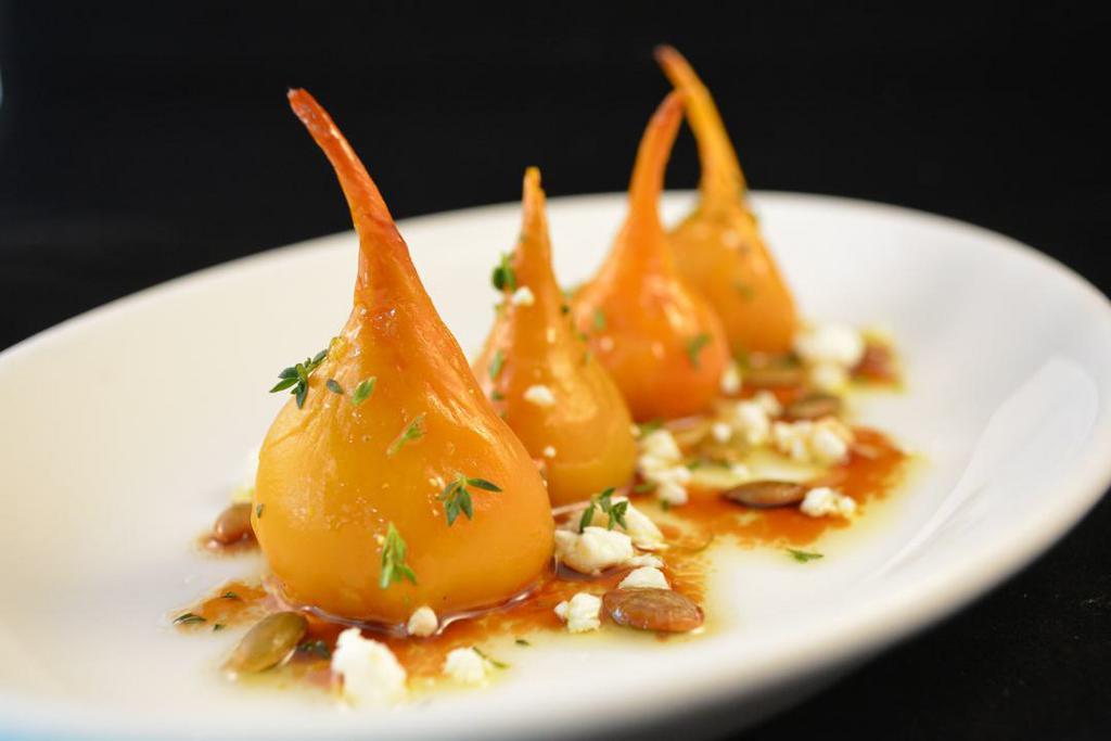 Baby Beets · Baby golden beets roasted and served with  goat cheese, toasted sunflower seeds, honey, fresh thyme and extra virgin olive oil *gluten free vegan, vegetarian