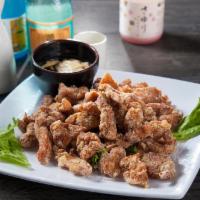 A13. Sesame Chicken · Marinated chicken with sesame and soy sauce.