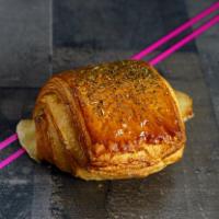 Ham and Cheese Croissant · Croissant dough rolled around ham and swiss cheese, sprinkled with herbs. Contains wheat, mi...