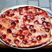 Pepperoni Pizza · Freshly sliced natural-casing pepperoni, mozzarella, San Marzano tomatoes, and freshly grate...