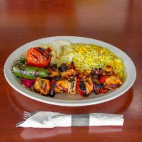 Chicken Kabob · Marinated chicken breast skewered and broiled to perfection 
