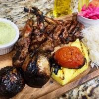 Lamb Chops · 4 pieces. A house specialty, marinated with oregano and fresh herbs, charbroiled to tender p...