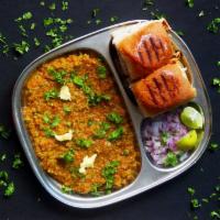 Pav Bhaji · 2 Pavs (Bread) with curry.