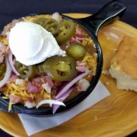 LOADED CHILI BOWL (contains meat) · Cheddar cheese, jalapenos, raw onion, sour cream, bacon bits.