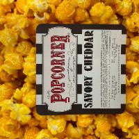Savory Cheddar Popcorn · A generous coating of American farm cheddar makes this popcorn the perfect salty snack.