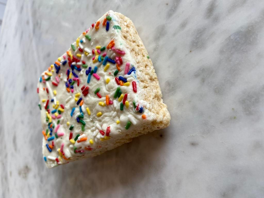 Birthday Cake Gourmet Crispy Treat · Our Crispy treat is topped with a gluten free layer of Birthday Cake batter and extra sprinkles.