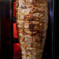 Double Gyro Plate (100% MEAT) · Tender lamb and beef grilled vertically & thinly sliced served over rice and side green sala...