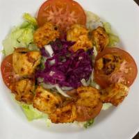 Chicken Salad · Marinaded grilled chicken served over fresh Greek salad. Served with house dressing.