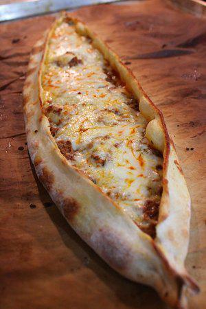 Gyro Pide · Our cheese pide topped with sliced gyro meat.