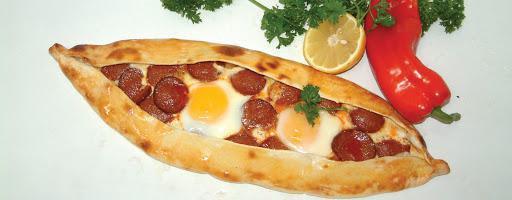 Breakfast Pide · Our cheese pide topped with beef pepperoni and eggs.
