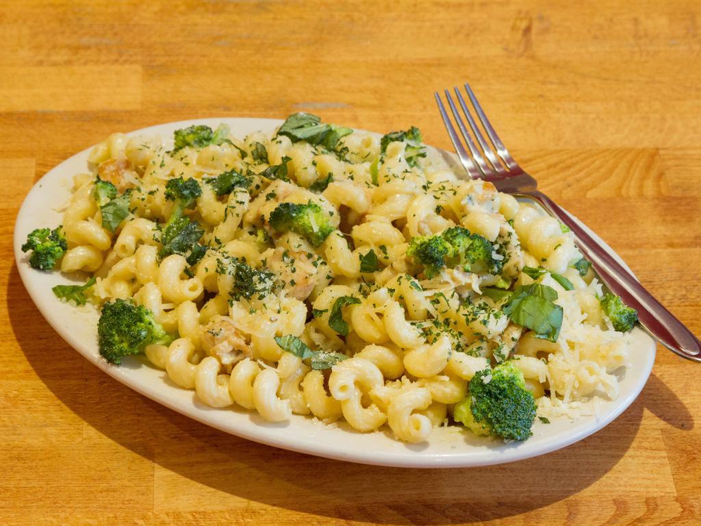 Chicken Alfredo Pasta · Cream, butter, parsley, broccoli and tossed with pasta. Served with garlic bread and choice of curly or linguini pasta.