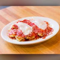 Homemade Chicken Parm Pasta · Served with garlic bread and choice of pasta curly or linguini 