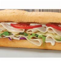 Turkey Ranch and Swiss Sub · Turkey, Swiss cheese, ranch dressing, lettuce, tomatoes and onions.